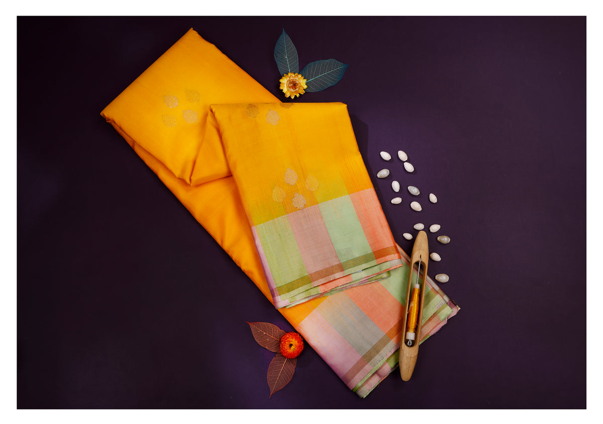 Suryaprabha Yellow Pastel Border Soft Silk Saree