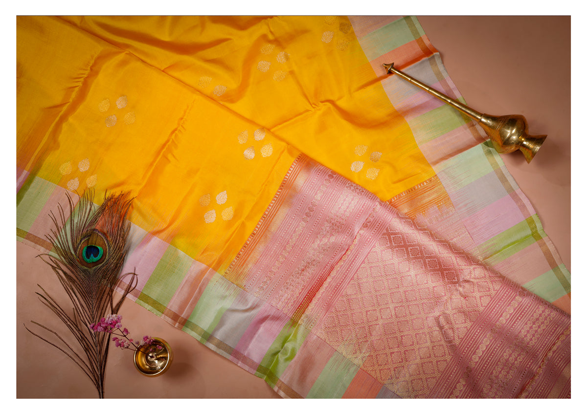 Suryaprabha Yellow Pastel Border Soft Silk Saree